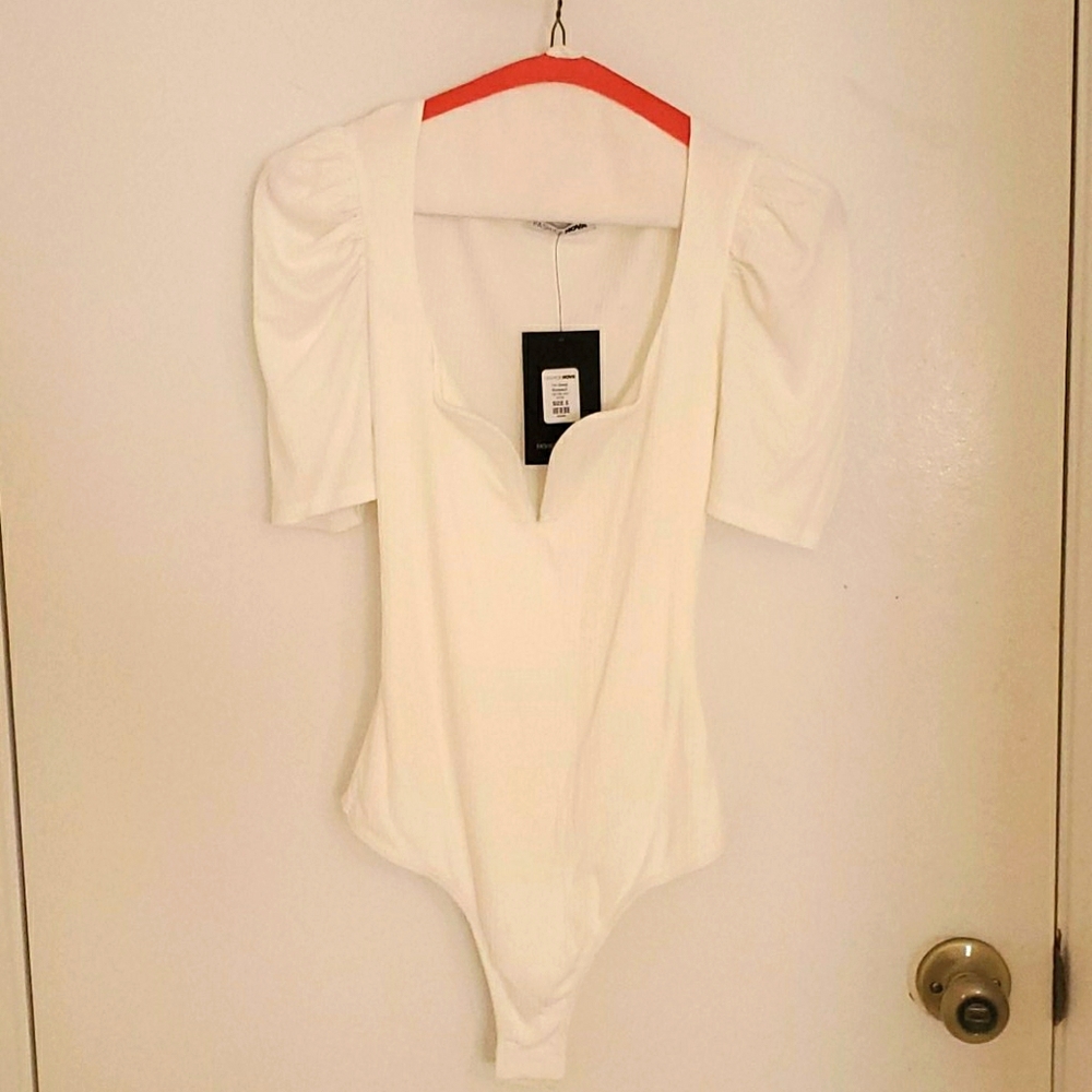 White top bodysuit